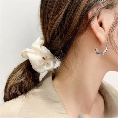 Boucles d'oreilles en or et en argent de luxe