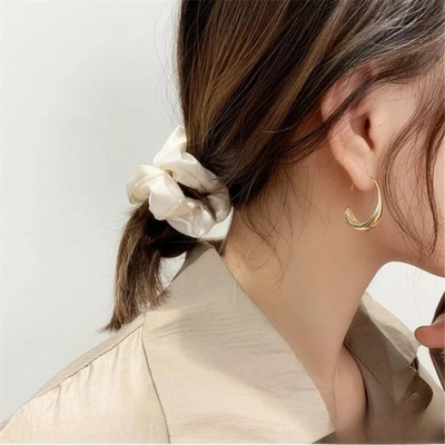 Boucles d'oreilles en or et en argent de luxe