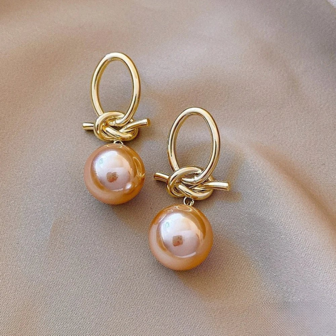 Boucles d'oreilles en or avec perle