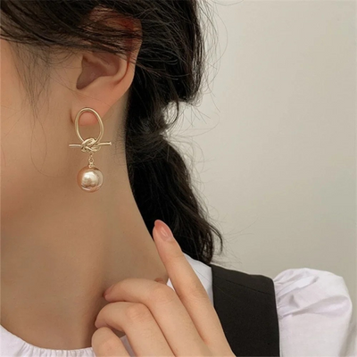 Boucles d'oreilles en or avec perle