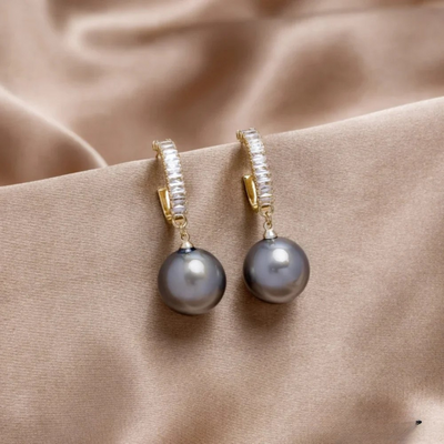 Boucles d'oreilles de luxe avec perle et zirconium