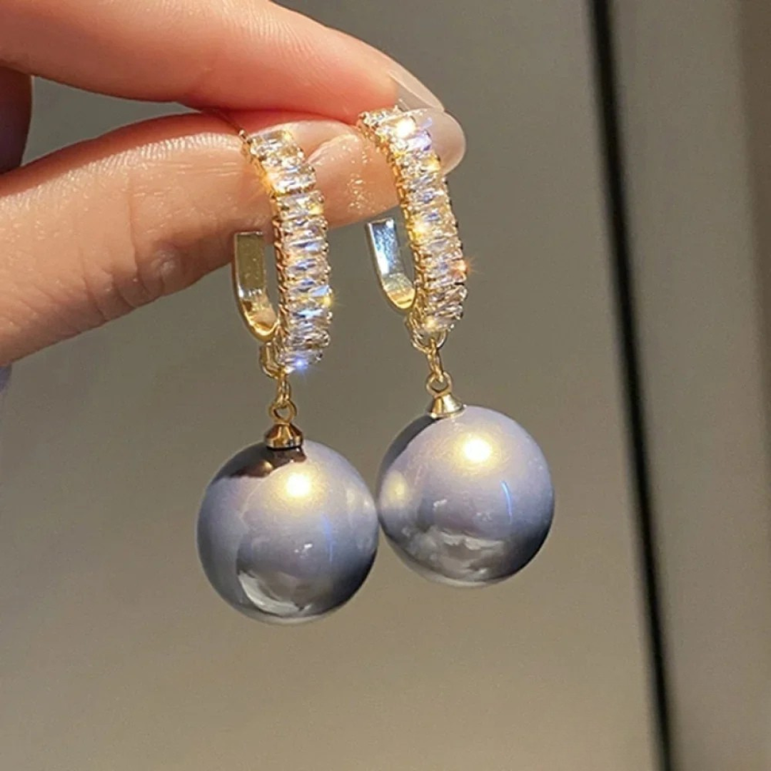 Boucles d'oreilles de luxe avec perle et zirconium