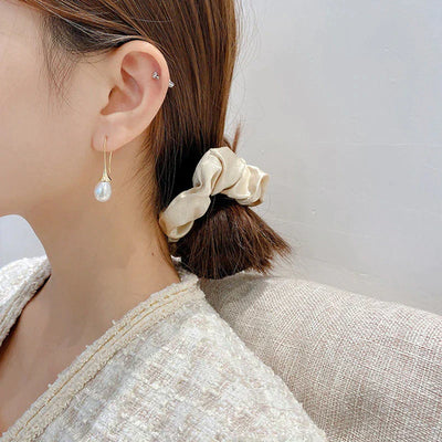 Boucles d'oreilles en forme de perle