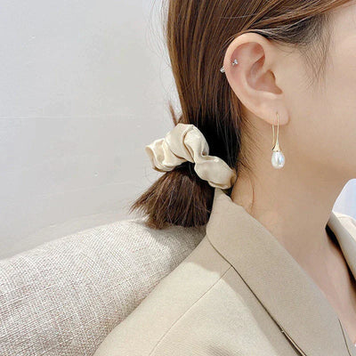 Boucles d'oreilles en forme de perle